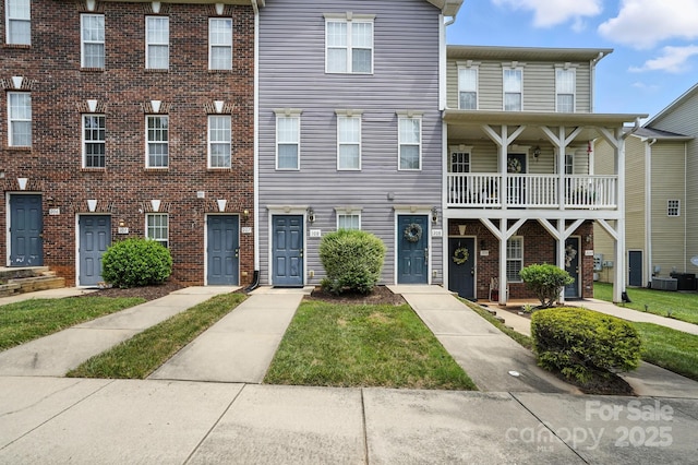 113 Steam Engine Dr Unit 108, Mooresville, NC 28115 - view of front of property featuring a balcony and brick siding