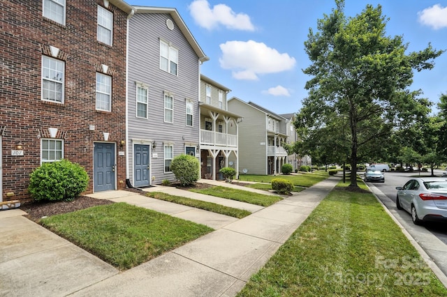 113 Steam Engine Dr Unit 108, Mooresville, NC 28115 - view of building exterior featuring a residential view