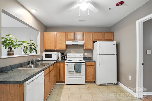 113 Steam Engine Dr Unit 108, Mooresville, NC 28115 - kitchen featuring white appliances, dark countertops, under cabinet range hood, a ceiling fan, and light tile patterned flooring