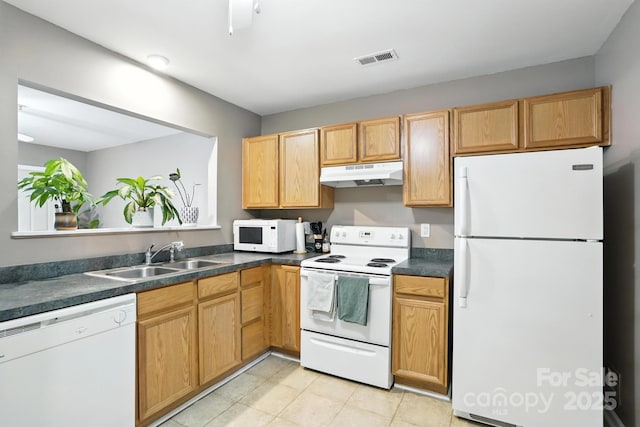 113 Steam Engine Dr Unit 108, Mooresville, NC 28115 - kitchen featuring white appliances, dark countertops, and under cabinet range hood