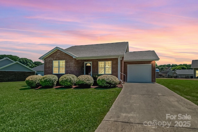 169 Abigail Ln, Locust, NC 28097 - ranch-style home featuring a garage, roof with shingles, a front yard, and driveway