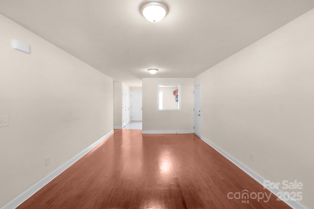 169 Abigail Ln, Locust, NC 28097 - unfurnished room featuring wood finished floors and baseboards