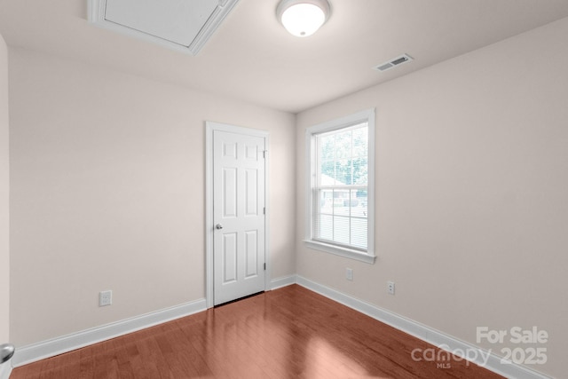 169 Abigail Ln, Locust, NC 28097 - spare room featuring wood finished floors and baseboards