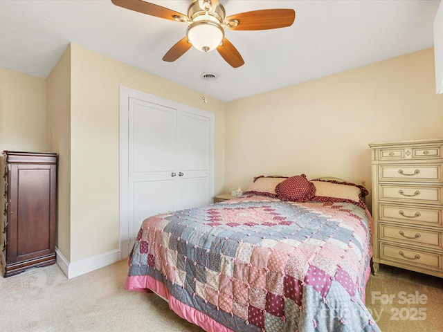 209 11th St, Spencer, NC 28159 - bedroom featuring light carpet, ceiling fan, and a closet