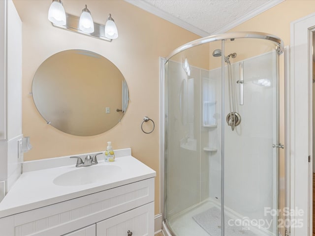 209 11th St, Spencer, NC 28159 - full bathroom featuring a stall shower, vanity, a textured ceiling, and ornamental molding