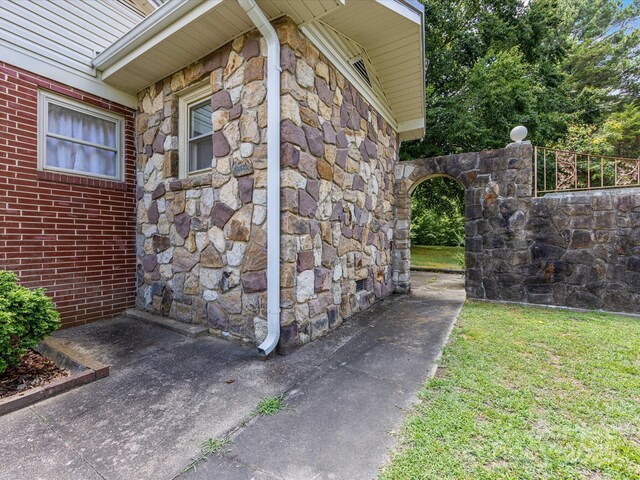 209 11th St, Spencer, NC 28159 - view of side of property with stone siding