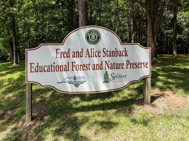 209 11th St, Spencer, NC 28159 - community sign featuring a lawn and a view of trees