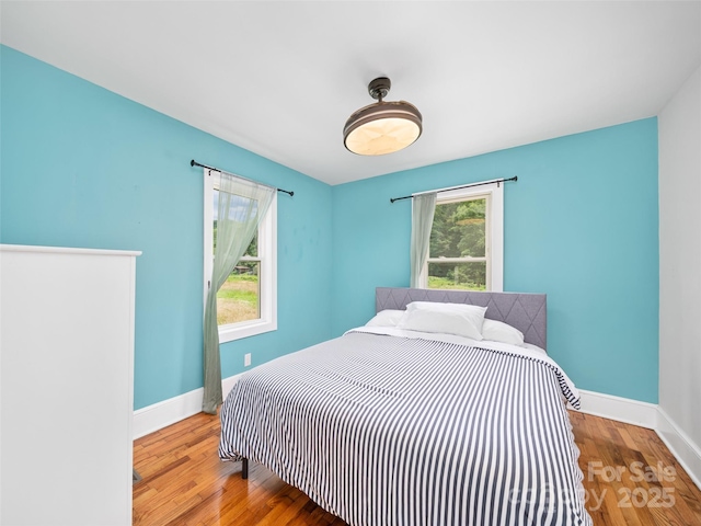 1767 N 226th Hwy, Bakersville, NC 28705 - bedroom featuring wood finished floors and baseboards