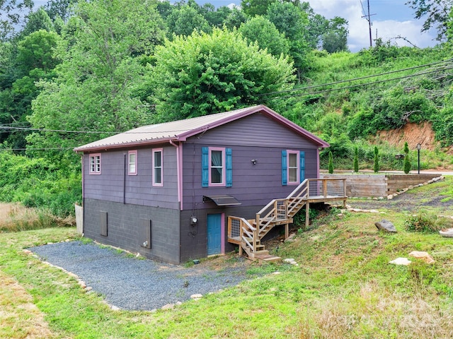 1767 N 226th Hwy, Bakersville, NC 28705 - back of house featuring stairway, a metal roof, and a deck