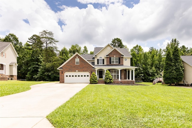 1309 Stonewyck Dr, Salisbury, NC 28146 - view of front facade with driveway, brick siding, a front lawn, and covered porch