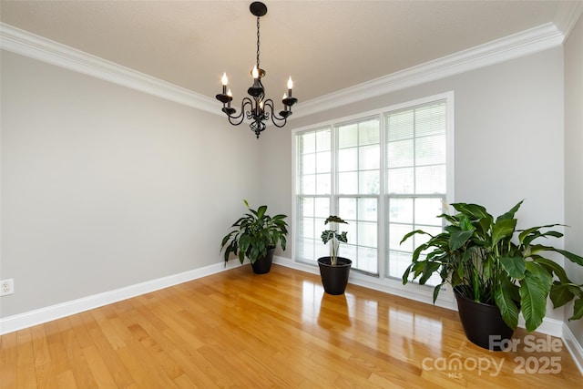 1309 Stonewyck Dr, Salisbury, NC 28146 - empty room with crown molding, a chandelier, and light wood finished floors