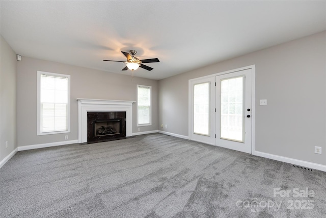 1309 Stonewyck Dr, Salisbury, NC 28146 - unfurnished living room featuring ceiling fan, carpet flooring, and a high end fireplace