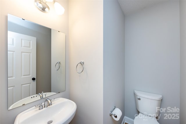 1309 Stonewyck Dr, Salisbury, NC 28146 - bathroom featuring a sink and toilet