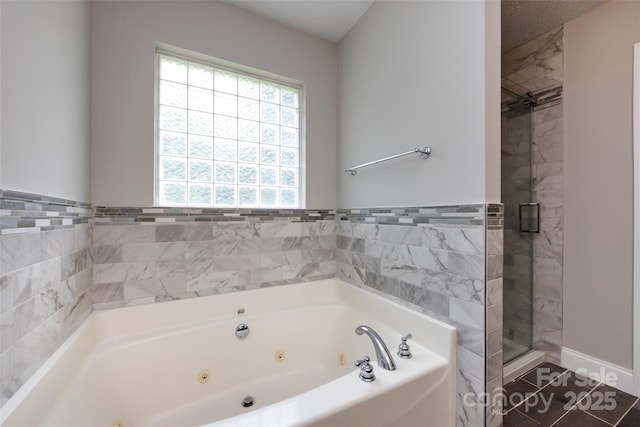 1309 Stonewyck Dr, Salisbury, NC 28146 - bathroom with a jetted tub and a shower stall