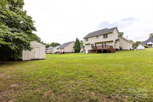 1309 Stonewyck Dr, Salisbury, NC 28146 - rear view of property with a storage unit, a lawn, and a deck