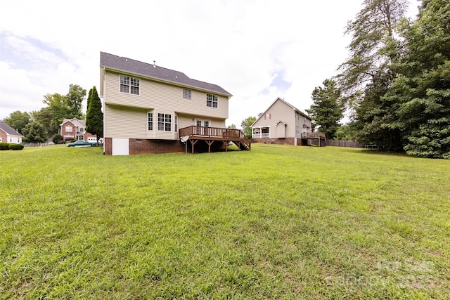 1309 Stonewyck Dr, Salisbury, NC 28146 - back of property featuring a wooden deck and a lawn
