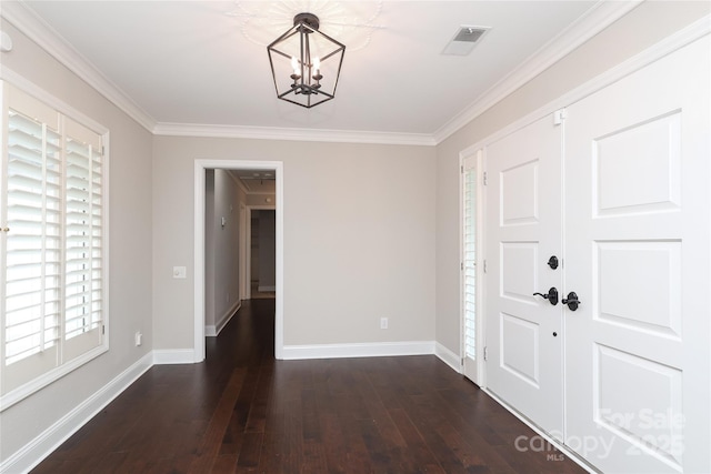 4350 Old Saybrook Ct, Charlotte, NC 28211 - entryway featuring wood-type flooring, a chandelier, and crown molding