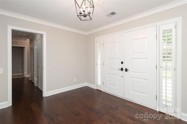 4350 Old Saybrook Ct, Charlotte, NC 28211 - entryway featuring dark wood-style flooring, a chandelier, and crown molding