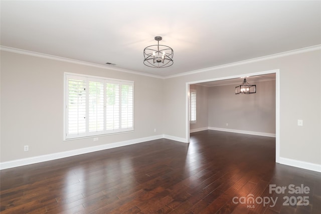 4350 Old Saybrook Ct, Charlotte, NC 28211 - empty room featuring a chandelier, dark wood-style floors, and ornamental molding
