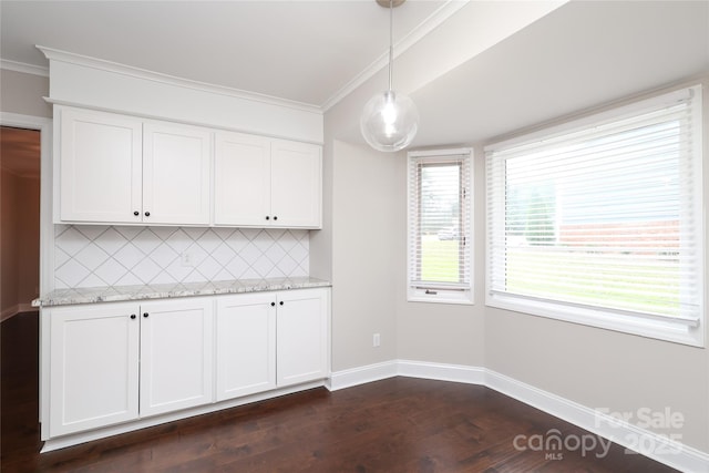 4350 Old Saybrook Ct, Charlotte, NC 28211 - kitchen with tasteful backsplash, dark wood-style flooring, crown molding, white cabinetry, and light stone countertops