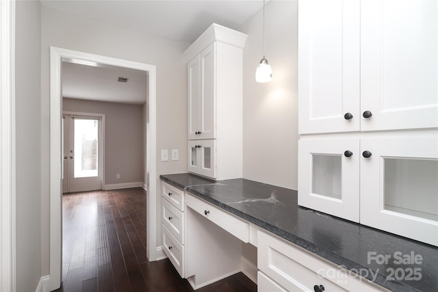 4350 Old Saybrook Ct, Charlotte, NC 28211 - kitchen featuring dark wood finished floors, white cabinetry, and dark stone countertops