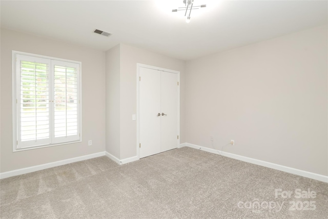 4350 Old Saybrook Ct, Charlotte, NC 28211 - unfurnished bedroom featuring carpet flooring and a closet
