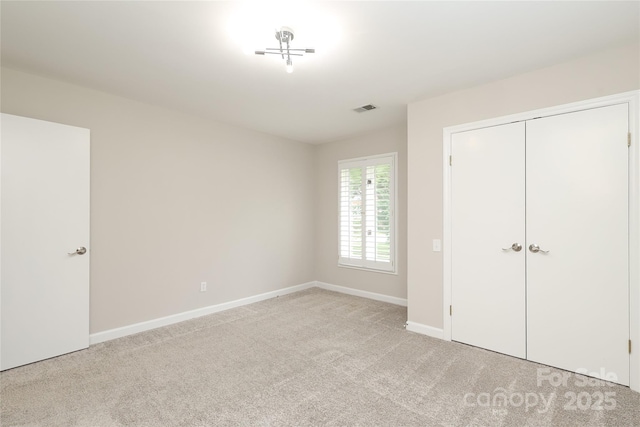 4350 Old Saybrook Ct, Charlotte, NC 28211 - unfurnished bedroom featuring light colored carpet and a closet
