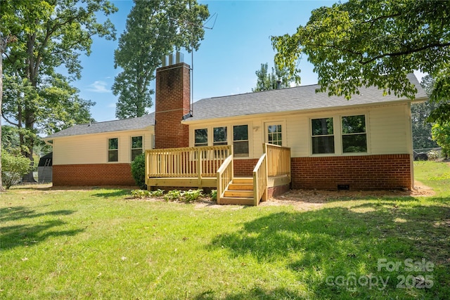 113 Oakleaf Dr, Landrum, SC 29356 - back of property featuring brick siding, a lawn, and a deck