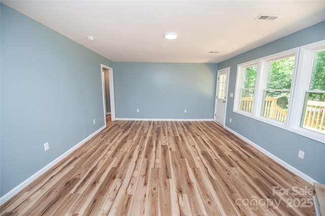 113 Oakleaf Dr, Landrum, SC 29356 - empty room featuring light wood finished floors and baseboards