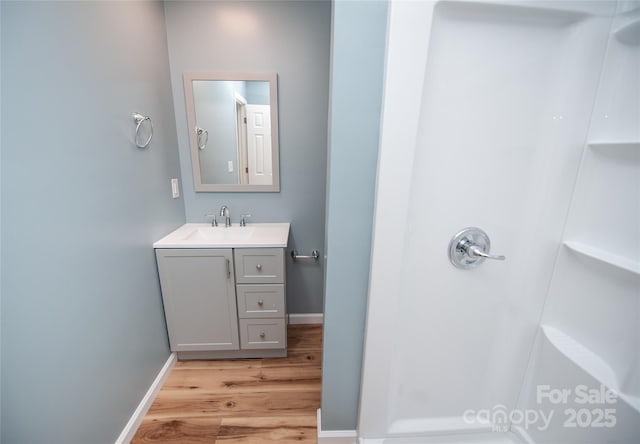 113 Oakleaf Dr, Landrum, SC 29356 - full bath featuring wood finished floors, a stall shower, and vanity
