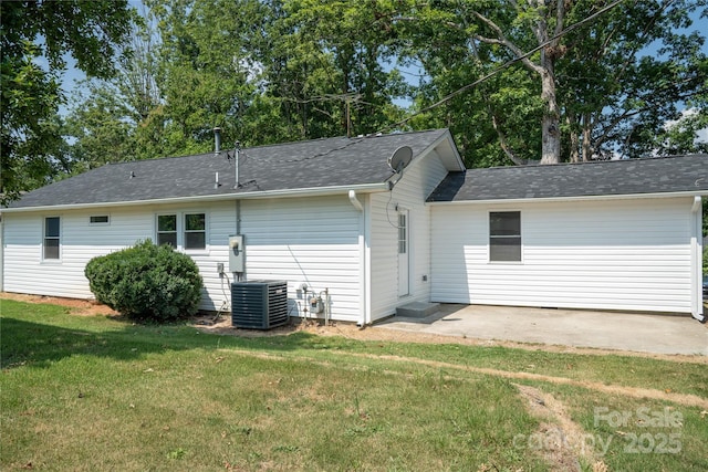 113 Oakleaf Dr, Landrum, SC 29356 - rear view of house with a yard, a shingled roof, and a patio area