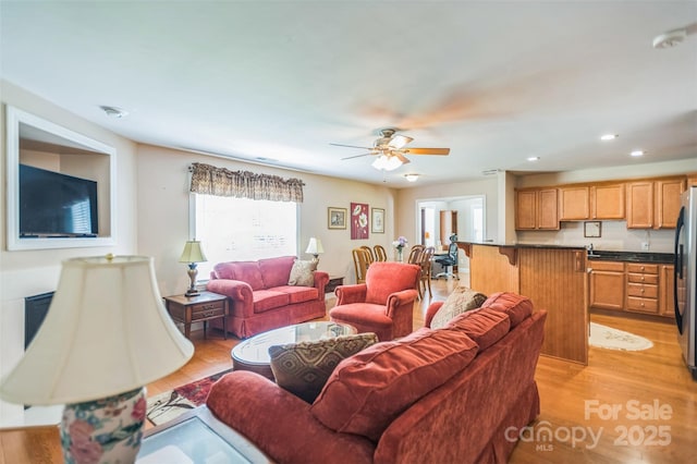 211 Abee St, Morganton, NC 28655 - living area featuring light wood-style flooring, recessed lighting, and a ceiling fan