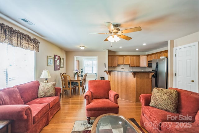 211 Abee St, Morganton, NC 28655 - living area featuring light wood finished floors, a ceiling fan, and recessed lighting