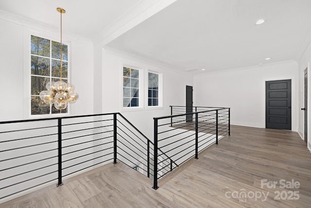 3830 Mill Run, Terrell, NC 28682 - corridor featuring an upstairs landing, a chandelier, ornamental molding, wood finished floors, and recessed lighting