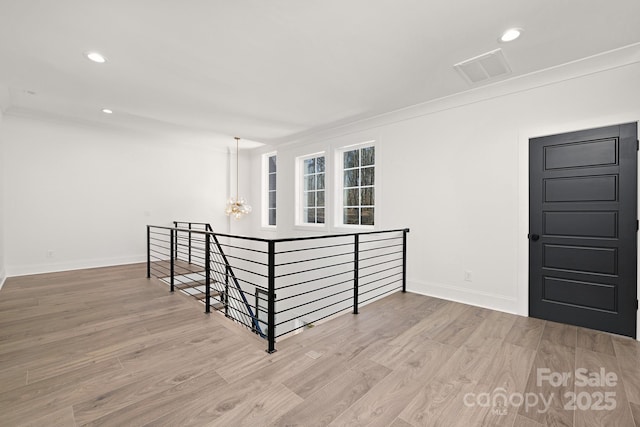 3830 Mill Run, Terrell, NC 28682 - empty room with wood finished floors, recessed lighting, and a chandelier