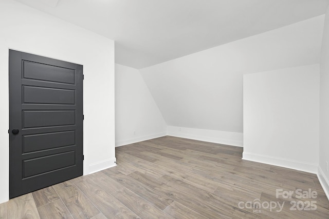 3830 Mill Run, Terrell, NC 28682 - additional living space featuring wood finished floors and vaulted ceiling