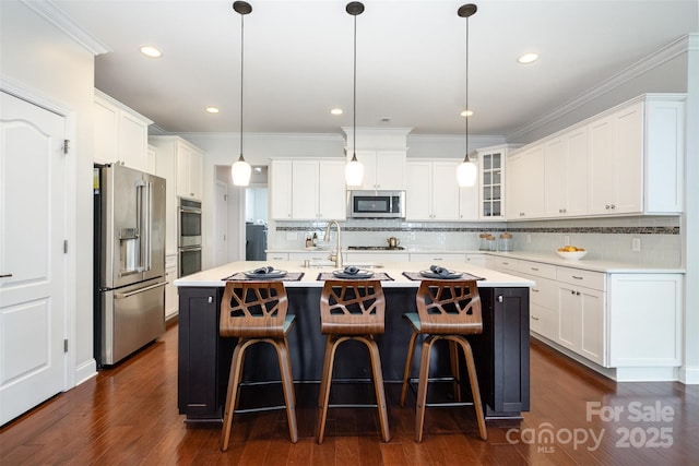 3021 Henshaw Rd, Waxhaw, NC 28173 - kitchen featuring stainless steel appliances, light countertops, tasteful backsplash, crown molding, and recessed lighting