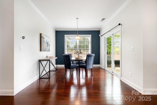 3021 Henshaw Rd, Waxhaw, NC 28173 - dining space featuring ornamental molding, healthy amount of natural light, and wood-type flooring