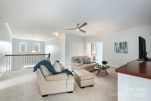 3021 Henshaw Rd, Waxhaw, NC 28173 - living area featuring light colored carpet, a ceiling fan, and crown molding