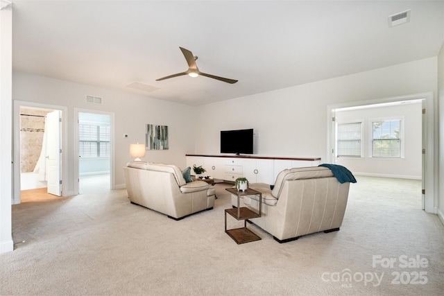 3021 Henshaw Rd, Waxhaw, NC 28173 - living area featuring carpet, plenty of natural light, and ceiling fan