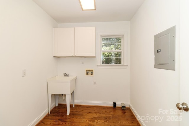 444 Cottonfield Cir, Waxhaw, NC 28173 - laundry area with cabinet space, wood finished floors, washer hookup, and electric panel