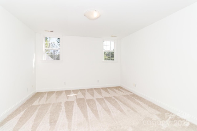 444 Cottonfield Cir, Waxhaw, NC 28173 - empty room with light colored carpet and healthy amount of natural light