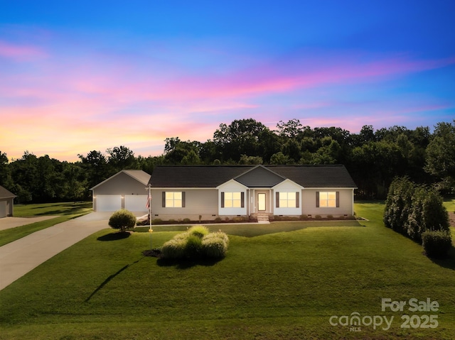 240 Red Cedar Rd, Mooresville, NC 28115 - ranch-style house with concrete driveway, a front yard, an outbuilding, and a garage