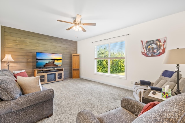 240 Red Cedar Rd, Mooresville, NC 28115 - living area with carpet flooring, ceiling fan, an accent wall, and wood walls