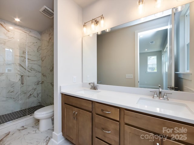 7004 Impulse Ct, Charlotte, NC 28205 - bathroom with a marble finish shower, double vanity, and marble finish floors