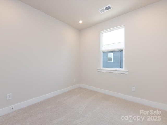 7004 Impulse Ct, Charlotte, NC 28205 - spare room featuring light carpet and recessed lighting