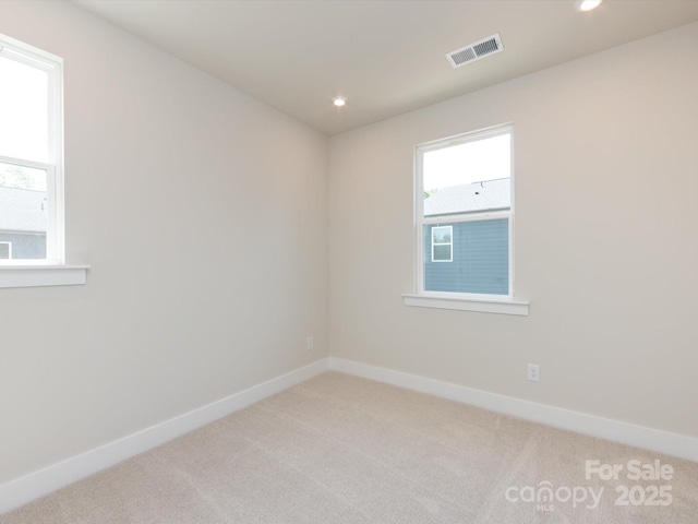 7004 Impulse Ct, Charlotte, NC 28205 - unfurnished room with light carpet and recessed lighting
