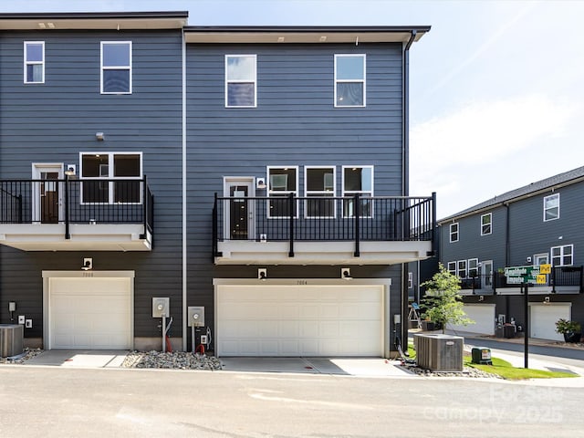 7004 Impulse Ct, Charlotte, NC 28205 - view of front facade with an attached garage and a balcony