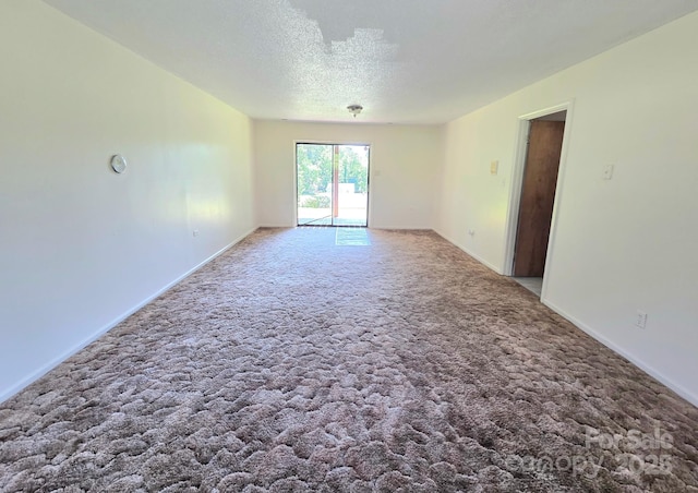 717 2nd St SW, Conover, NC 28613 - empty room featuring carpet and a textured ceiling
