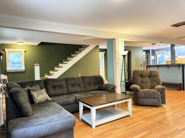 491 W Main St, Waldoboro, ME 04572 - living area featuring stairway, light wood finished floors, and plenty of natural light